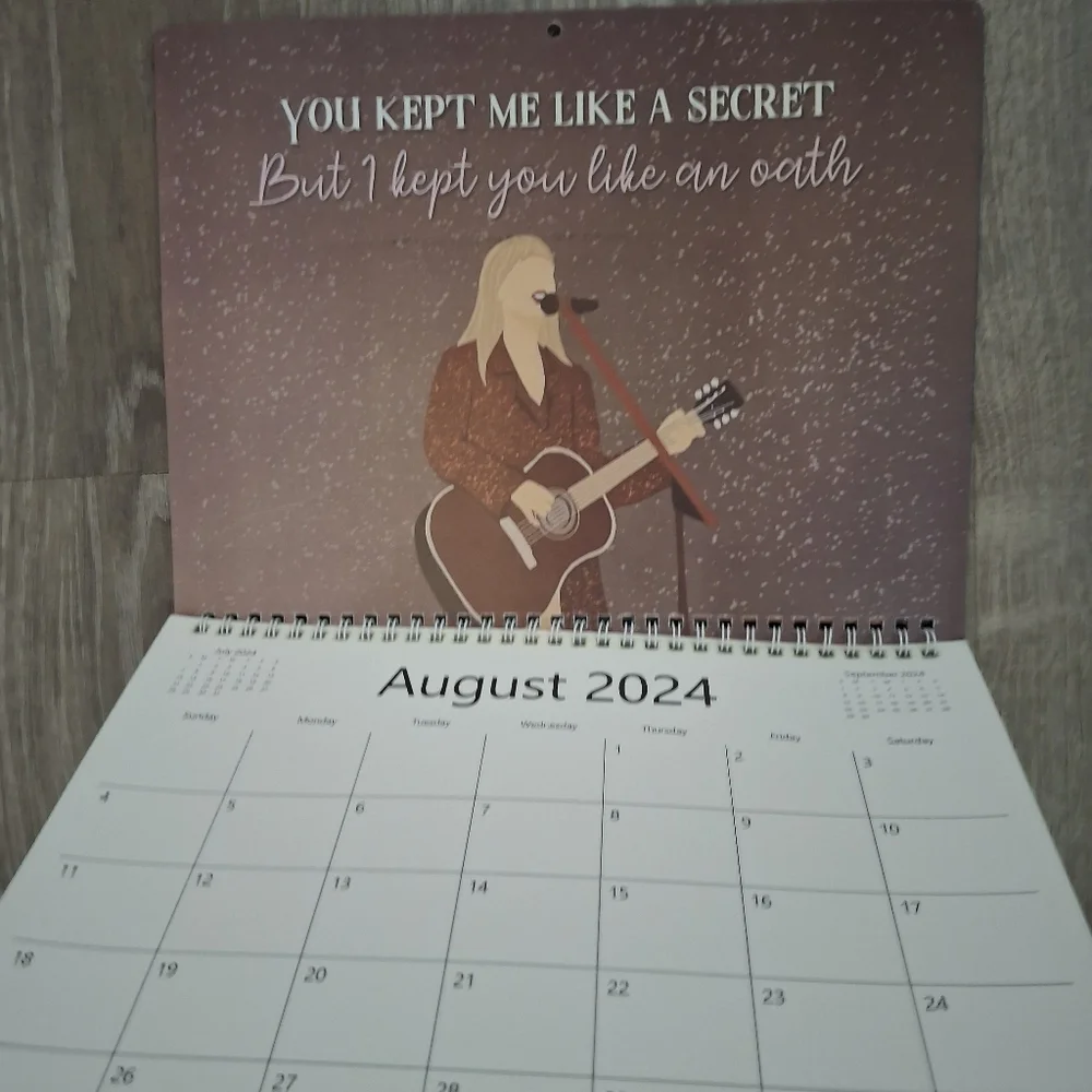 Taylor Swift 2024 wall calendar featuring iconic photos and lyrics artwork walla